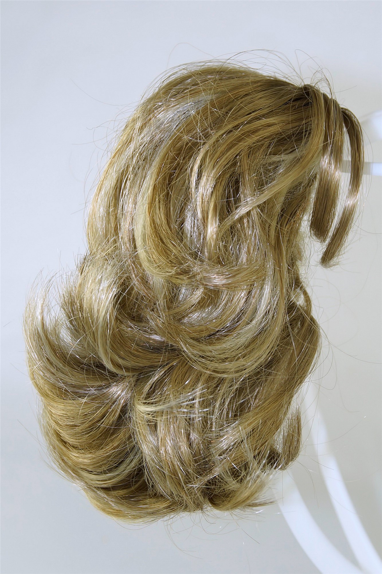 Ponytails, blond mix, curled, short